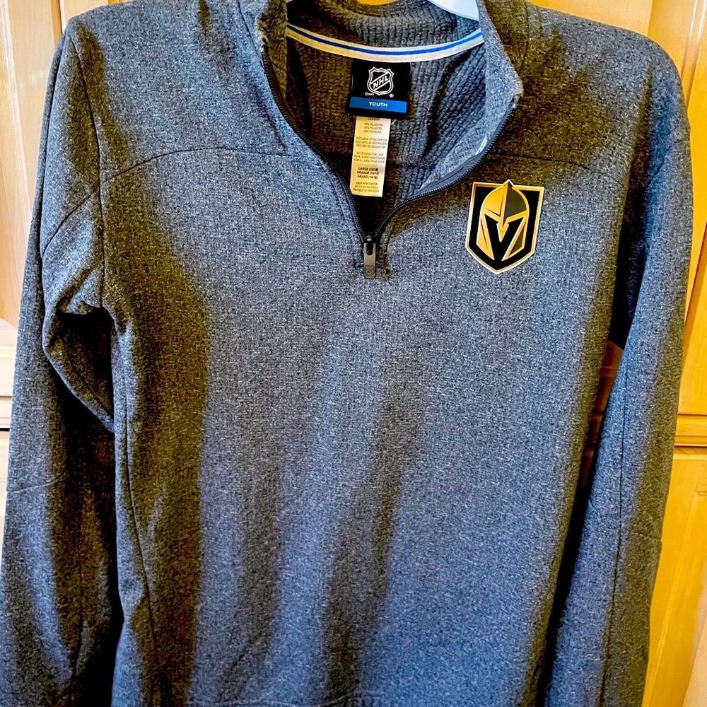 Vegas Golden Knights shirt.